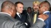 De gauche à droite, le président gabonais Ali Bongo, le président français Emmanuel Macron, le roi du Maroc Mohammed VI et le Premier ministre bissau-guinéen Umaro Sissoco Embalo à Abidjan, le 29 novembre 2017.