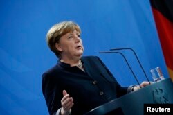 German Chancellor Angela Merkel during news conference at the chancellery in Berlin, Germany, Jan. 16, 2017.