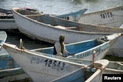 Artisanal fishing boats moored in the harbor at Nouadhibou, the main port in Mauritania, April 14, 2018.