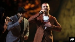 FILE - Sam Smith performs at the Brit Awards 2018 in London, Feb. 21, 2018.