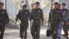 Myanmar's army chief, Senior General Min Aung Hlaing (C), is seen arriving with senior military officials to observe military exercises in Myanmar's Ayeyarwaddy Delta region, February 3, 2018.