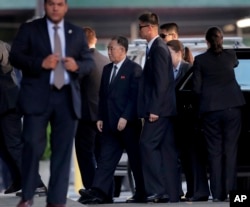 Kim Yong Chol, center, former North Korean military intelligence chief and one of Kim Jong Un's closest aides, arrives to have dinner with U.S. Secretary of State Mike Pompeo, May 30, 2018, in New York.