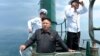 김정은 잠수함 부대 방문 공개…한국 군 "성능 크게 떨어져"
