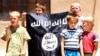 Bosnian children with an Islamic State flag are seen in an IS video. 