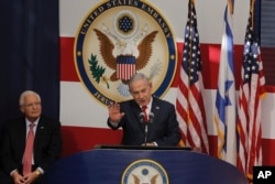 Israel's Prime Minister Benjamin Netanyahu delivers his speech as U.S. ambassador to Israel David Friedman listen, during the opening ceremony of the new US embassy in Jerusalem, May 14, 2018.