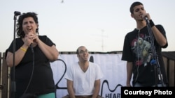 Musical group Heartbeat performs a concert in Haifa; from left: Yasmina Abu Nassar, Ami Yares, Moody Kablawi. (Osseily Hanna)