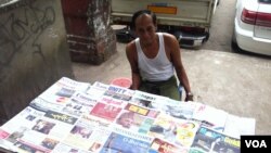 Newspaper Seller Oo Zay Yar, says all of Burma welcomes President Barack Obama's visit because of the hope he can spur economic, social, and political developments, Rangoon, Burma, November 12, 2012. (D. Schearf/VOA)