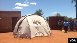 Some Chingwizi refugees have been living in this tent for the past two years, February 2016. (S. Mohfu/VOA)