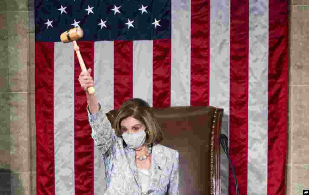 Speaker of the House Nancy Pelosi of California waves the gavel on the opening day of the 117th Congress on Capitol Hill in Washington, D.C., Jan. 3, 2021.