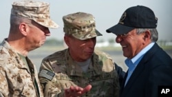 USMC Gen. John Allen, left, and Gen. David Petraeus, incoming CIA Director, greets former CIA Director and new U.S. Defense Secretary Leon Panetta as he lands in Kabul, Afghanistan, Saturday, July 9, 2011.