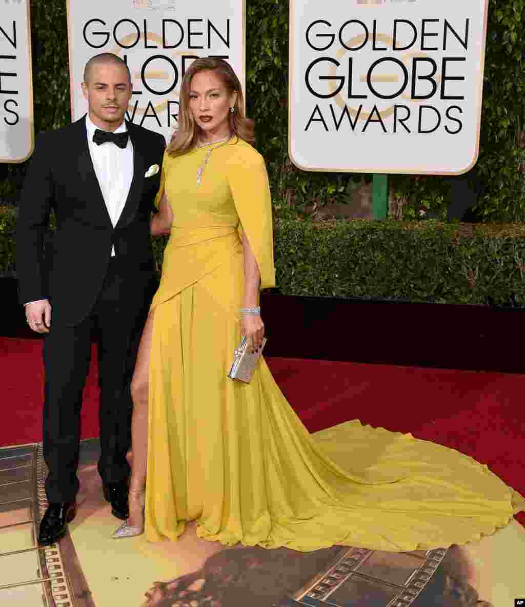 Casper Smart, left, and Jennifer Lopez arrive at the 73rd annual Golden Globe Awards on Jan. 10, 2016, at the Beverly Hilton Hotel in Beverly Hills, Calif. 