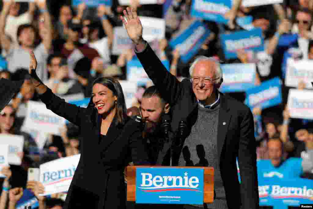 U.S. Rep. Alexandria Ocasio-Cortez (D-NY) introduces Democratic 2020 presidential candidate and Senator Bernie Sanders (I-VT) during the &quot;Bernie&#39;s Back&quot; rally at Queensbridge Park in the Queens Borough of New York City, Oct. 19, 2019.