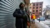 FILE -Indian paramilitary soldiers stand guard in Srinagar, Kashmir, Jan. 8, 2022. The Committee to Protect Journalists asked Indian authorities to release journalist Sajad Gul in Kashmir, days after police arrested him for uploading a video clip of a protest against Indian rule.