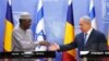 Israeli Prime Minister Benjamin Netanyahu, right, goes to shake hands with President of Chad Idriss Deby, during a joint press conference, in Jerusalem, Nov. 25, 2018. 