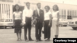 Tun Sovan, center, stands with his mother, two sisters and a brother-in-law. The photo was taken in front of Pochentong International Airport in 1962, before leaving to the United States. (Photo courtesy of Tun Sovan)