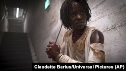 This image released by Universal Pictures shows Lupita Nyong'o in a scene from "Us."