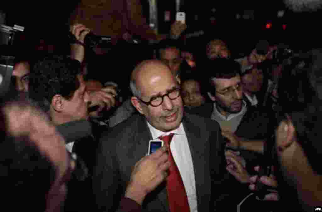 Former Director General of the International Atomic Energy Agency, IAEA, and Nobel Peace Prize winner Mohamed ElBaradei talks to members of the media as he arrives at Cairo's airport in Egypt, Thursday, Jan. 27, 2011. ElBaradei told reporters that 'the r