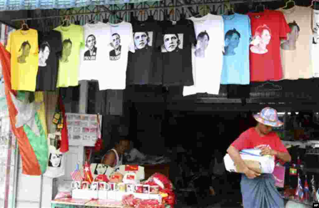 T-shirts printed with images of U.S. President Barack Obama and Myanmar opposition leader Aung San Suu Kyi are sold at a shop in Yangon, Myanmar, Friday, Nov. 16, 2012. Obama will visit Myanmar on Monday, becoming the first U.S. president to visit the onc