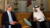 FILE - U.S. Secretary of State John Kerry meets with the Emir of Qatar Sheik Tamim bin Hamad Al Thani.