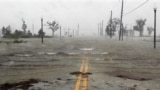 On Hurricane Katrina's seventh aniversary, Huricane Isaac floods parts of Waveland, Miss., Aug. 29, 2012.