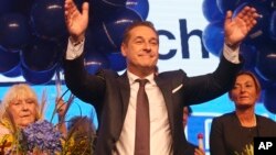 FILE - Hans-Christian Strache, leader of the strongly eurosceptic Austrian Freedom Party, waves to his supporters in Vienna, Austria, Oct. 15, 2017, after the closing of the polling stations for the Austrian national elections. 