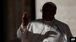 Pope Francis delivers a blessing during a Jubilee audience in St. Peter's Square, at the Vatican, Saturday, Nov. 12, 2016. 