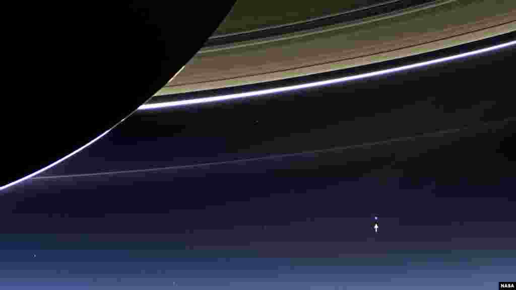 In this rare image taken on July 19, 2013, the wide-angle camera on NASA&#39;s Cassini spacecraft has captured Saturn&#39;s rings and our planet Earth and its moon in the same frame. (Credit: NASA/JPL-Caltech/Space Science Institute)