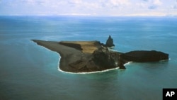 FILE - An aerial photo provided by Alaska Volcano Observatory/U.S. Geological Survey shows the Bogoslof Island looking south.
