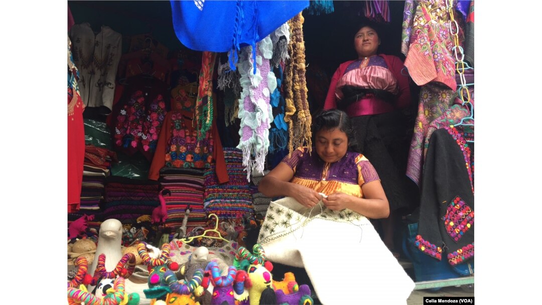 Indigenous women weave wool to sell. San Juan Chamula, Mexico, Feb. 15, 2016.