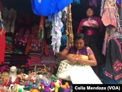 Indigenous women weave wool to sell. San Juan Chamula, Mexico, Feb. 15, 2016.