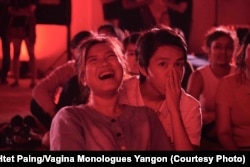 Women react at a Burmese language performance of "The Vagina Monologues,' in Yangon, Myanmar.