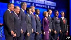 From left, John Kasich, Mike Huckabee, Jeb Bush, Marco Rubio, Donald Trump, Ben Carson, Carly Fiorina, Ted Cruz, Chris Christie and Rand Paul take the stage during the CNBC Republican presidential debate in Boulder, Colo., Oct. 28, 2015.