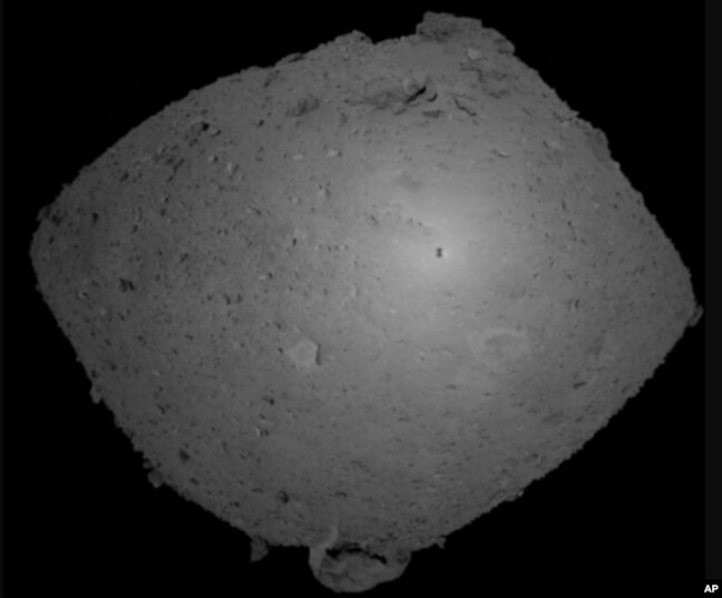 This Oct. 25, 2018, image provided by the Japan Aerospace Exploration Agency (JAXA) shows asteroid Ryugu.