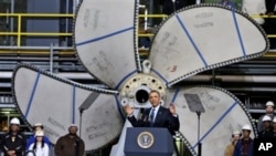 President Barack Obama addressubg shipbuilders about automatic defense budget cuts, Newport News Shipbuilding, Virginia, Feb. 26, 2013.
