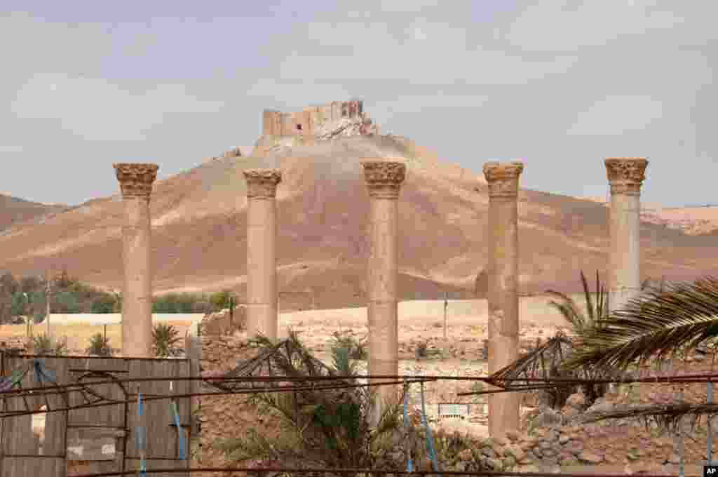 This photo released on Sunday March 27, 2016, by the Syrian official news agency SANA, shows a general view of Palmyra citadel, central Syria. 