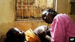 FILE - Childbirth in Africa.