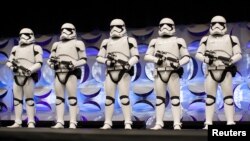 FILE - Redesigned stormtroopers appear onstage at the kick-off event of the Star Wars Celebration convention in Anaheim, California, April 16, 2015. 