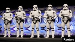 Redesigned stormtroopers appear onstage at the kick-off event of the Star Wars Celebration convention in Anaheim, California, April 16, 2015. 