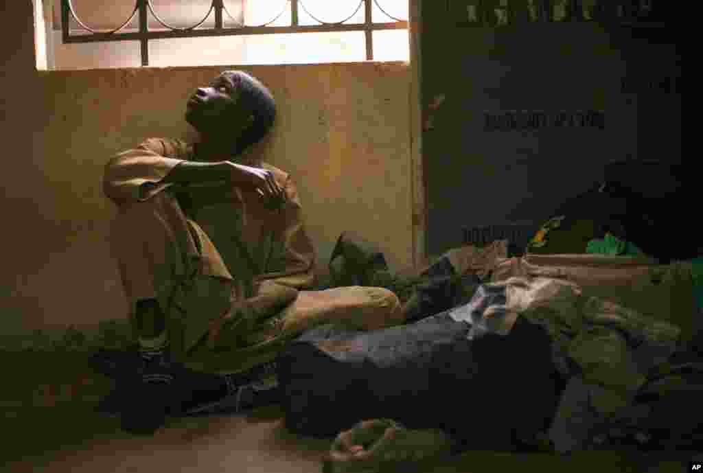 Adama Drabo, 16, sits in the police station in Sevare, Mali, January 25, 2013. He was captured traveling without papers by Malian troops and arrested on suspicion of working for Islamic militant group MUJAO.