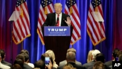 Republican presidential candidate Donald Trump speaks at the Trump Soho Hotel in New York, June 22, 2016. 