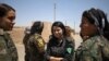 Combats pour le contrôle d'une base tenue par le groupe État islamique près de Raqa en Syrie