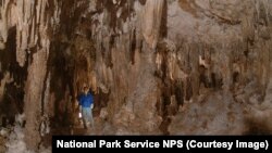 A highly decorated area can be illuminated using the lanterns on the guided tour of Carlsbad Cavern.