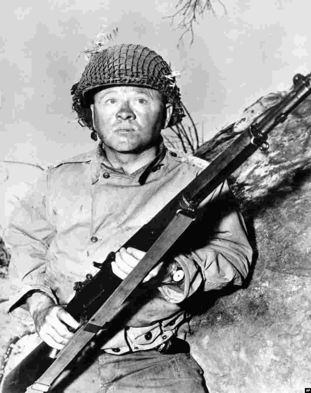 Actor Mickey Rooney is shown in this file photo as G.I. Dooley in the 1956 Hollywood movie &quot;The Bold and the Brave.&quot;&nbsp;