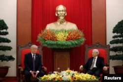 Vietnam 's Communist Party Secretary General Nguyen Phu Trong and U.S. President Donald Trump hold a bilateral meeting at Communist Party Headquarters in Hanoi, Vietnam, Nov. 12, 2017.
