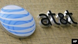 미국의 대형 통신업체 AT&T사가 거대 미디어 기업 타임워너사를 인수하는 것과 관련해 연방 정부가 소송을 제기했다. 미국 플로리다주 마이애미시의 AT&T 회사 건물.