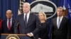 Acting Attorney General Matthew Whitaker, Commerce Secretary Wilbur Ross, from left, Homeland Security Secretary Kirstjen Nielsen and FBI Director Christopher Wray hold a news conference to announce indictments against China's Huawei Technologies Co Ltd.