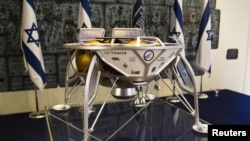 FILE - A model of a SpaceIL spacecraft is displayed in Jerusalem, Oct. 7, 2015. The Israeli team is competing in a race to the moon sponsored by Google.