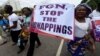 Des femmes participent à une marche de protestation contre les victimes d'attaques violentes, Lagos, Nigeria, 22 mai 2018.