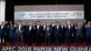 Leaders pose for a family photo at the APEC 2018 Economic Leaders Meeting at the APEC Haus at Port Moresby, Papua New Guinea, Nov. 18, 2018.