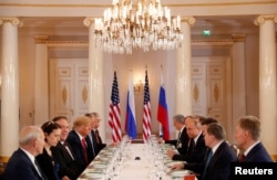 U.S. President Donald Trump participates in an expanded bilateral meeting with Russia's President Vladimir Putin in Helsinki, Finland, July 16, 2018.